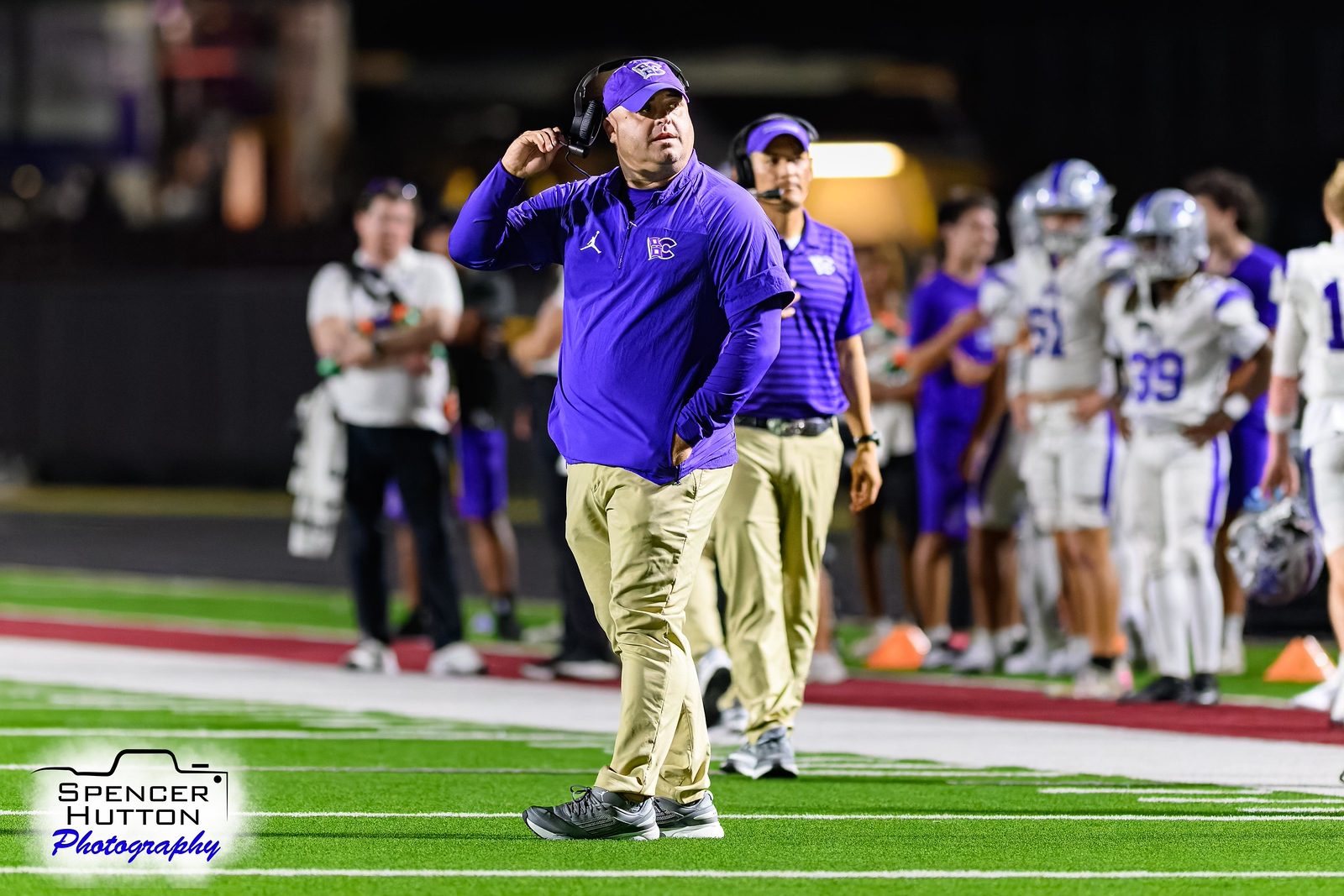 Head coach James Clancy works the sideline during the Week 4 win