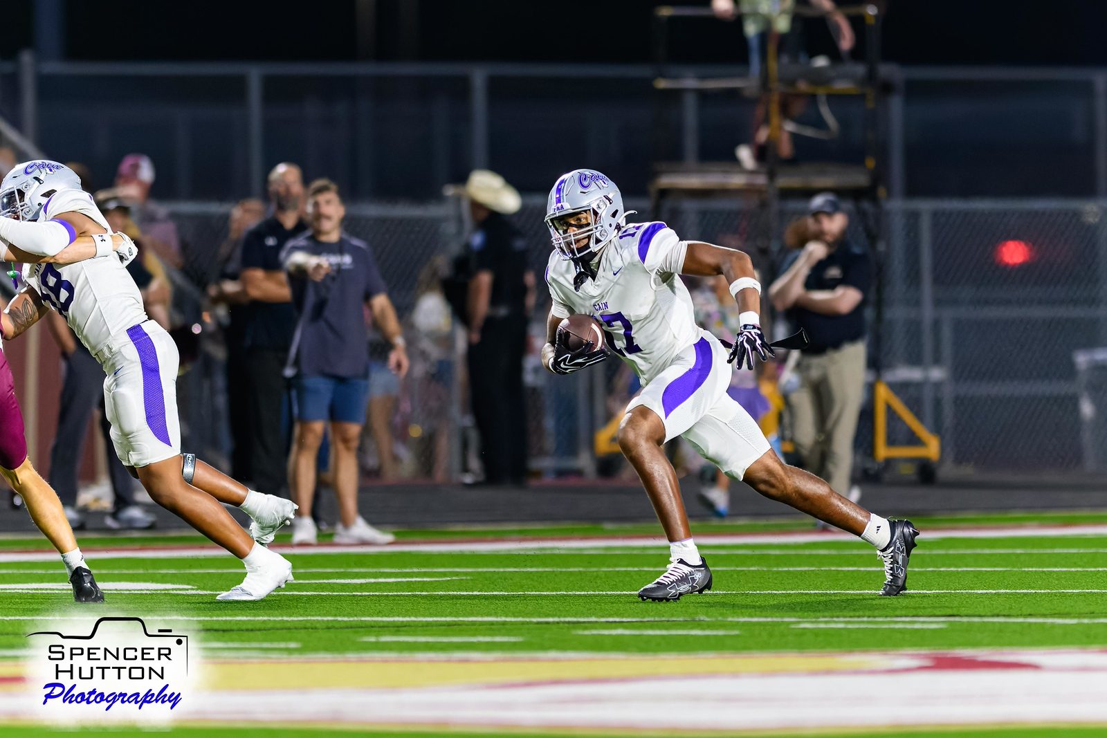 A Cain ball carrier cuts upfield against the Mustang defense