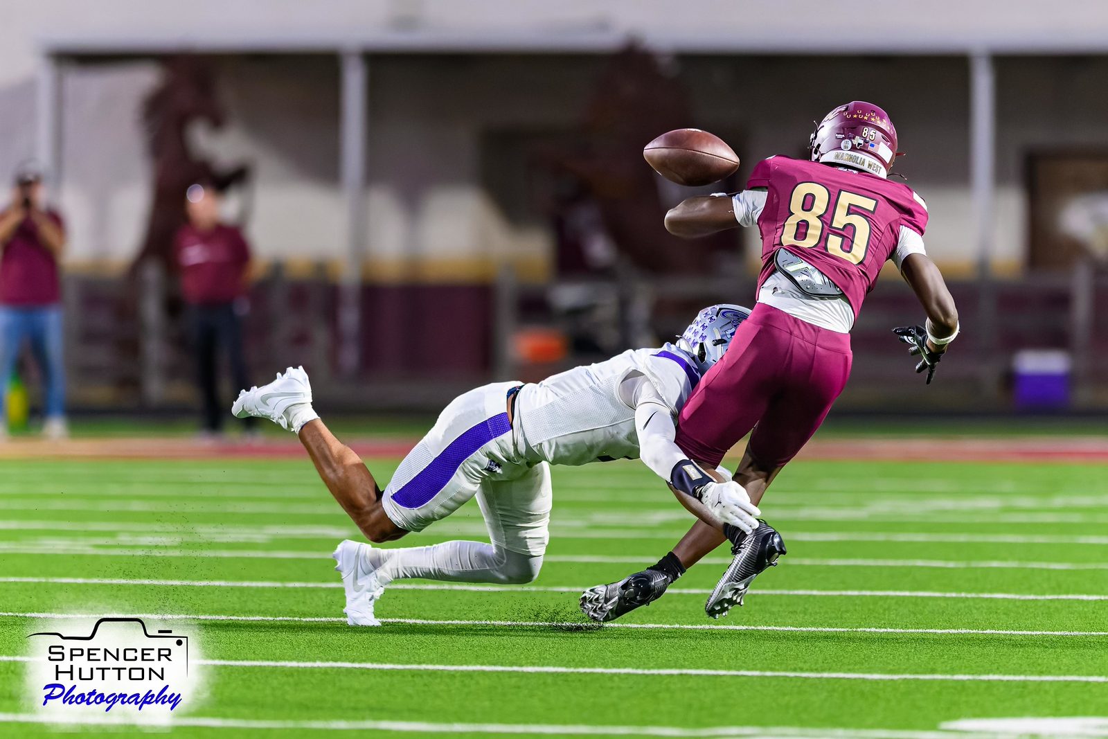 A Hurricane defender lays out for the stop in the open field