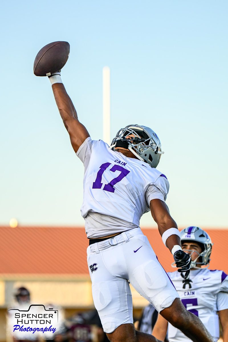Senior wide receiver Tyson Freeman rises high for a one-handed catch