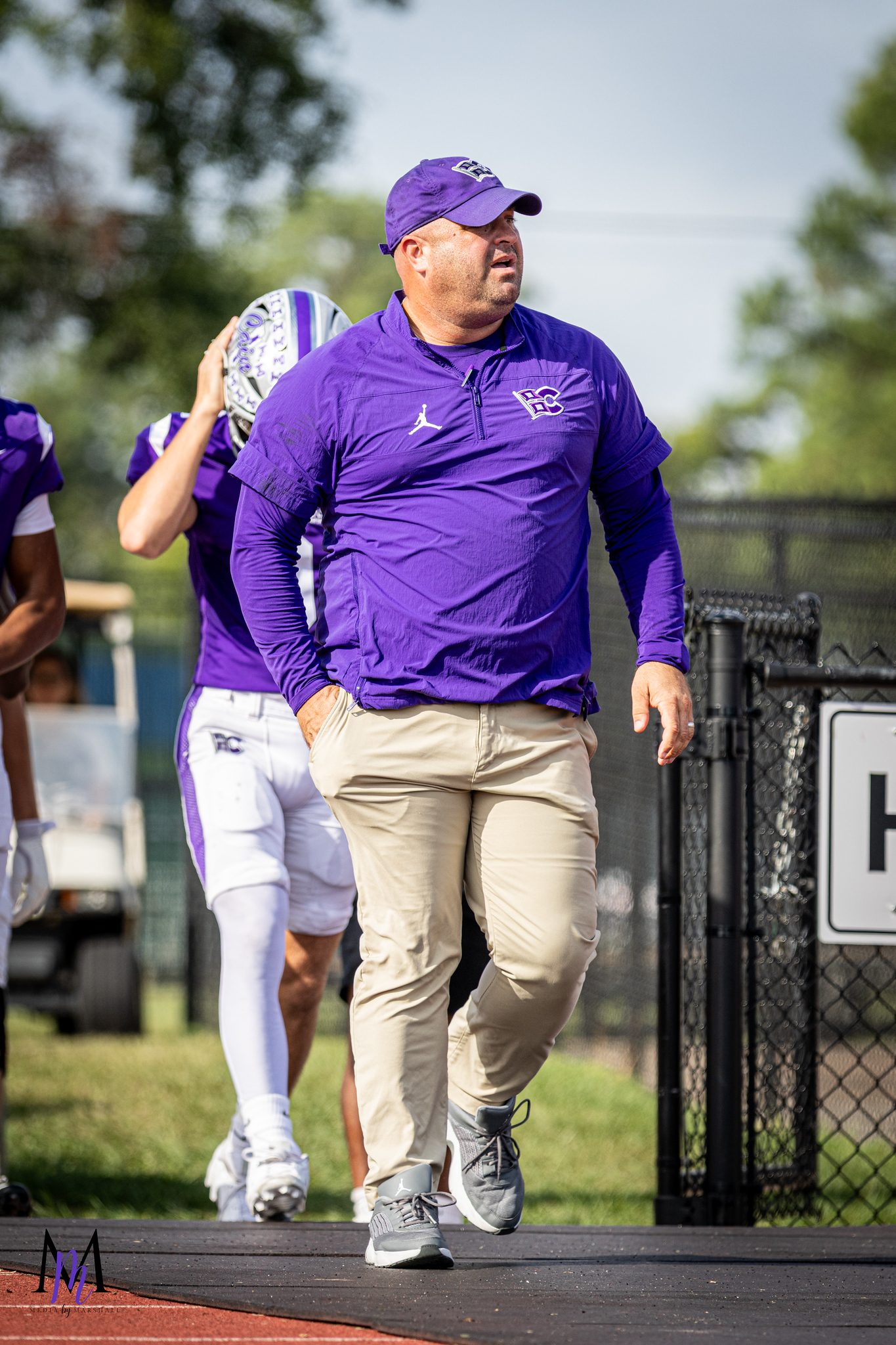 Head coach James Clancy works the sideline
