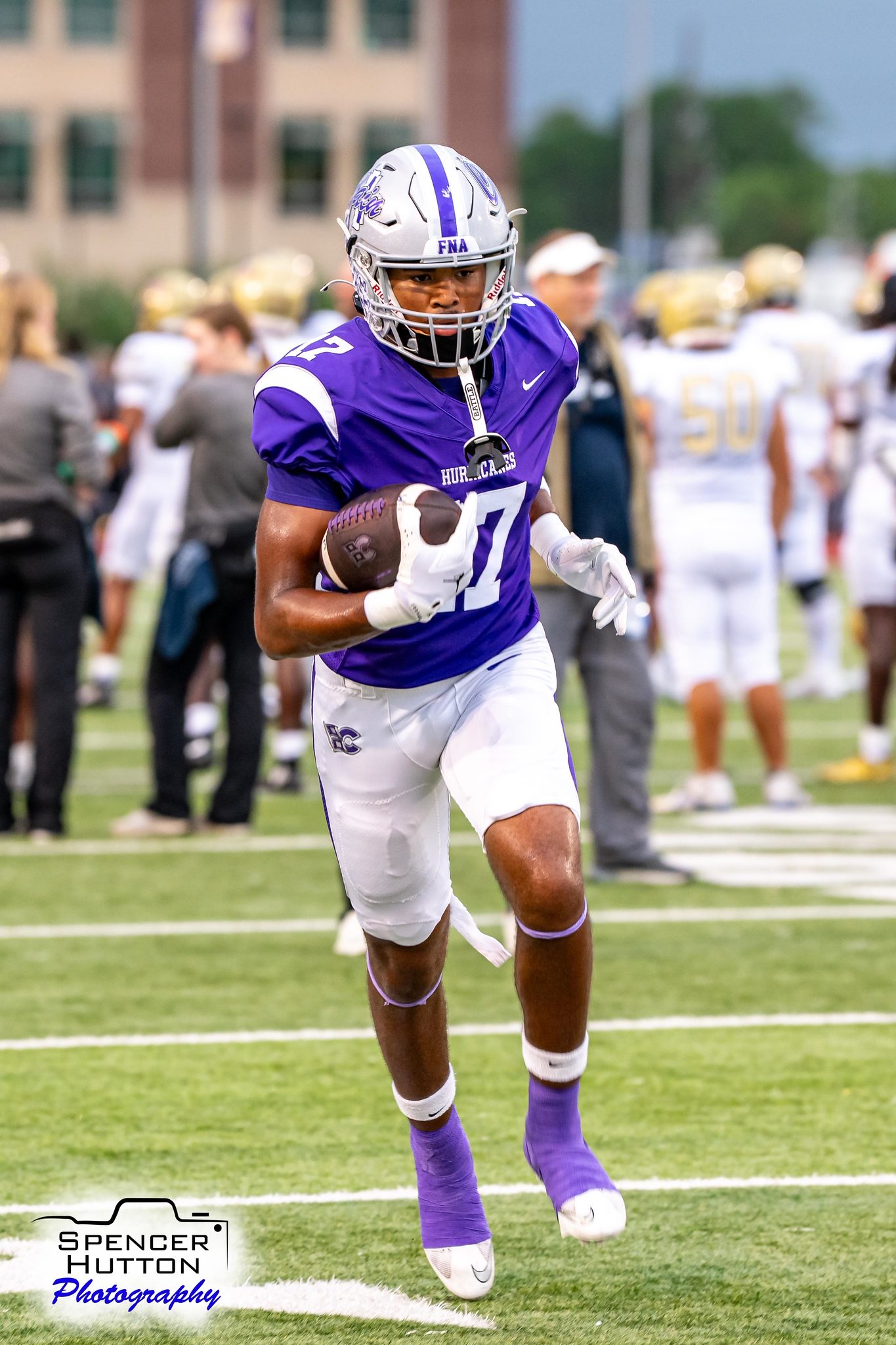 Senior wide receiver Tyson Freeman warms up before the Collins game