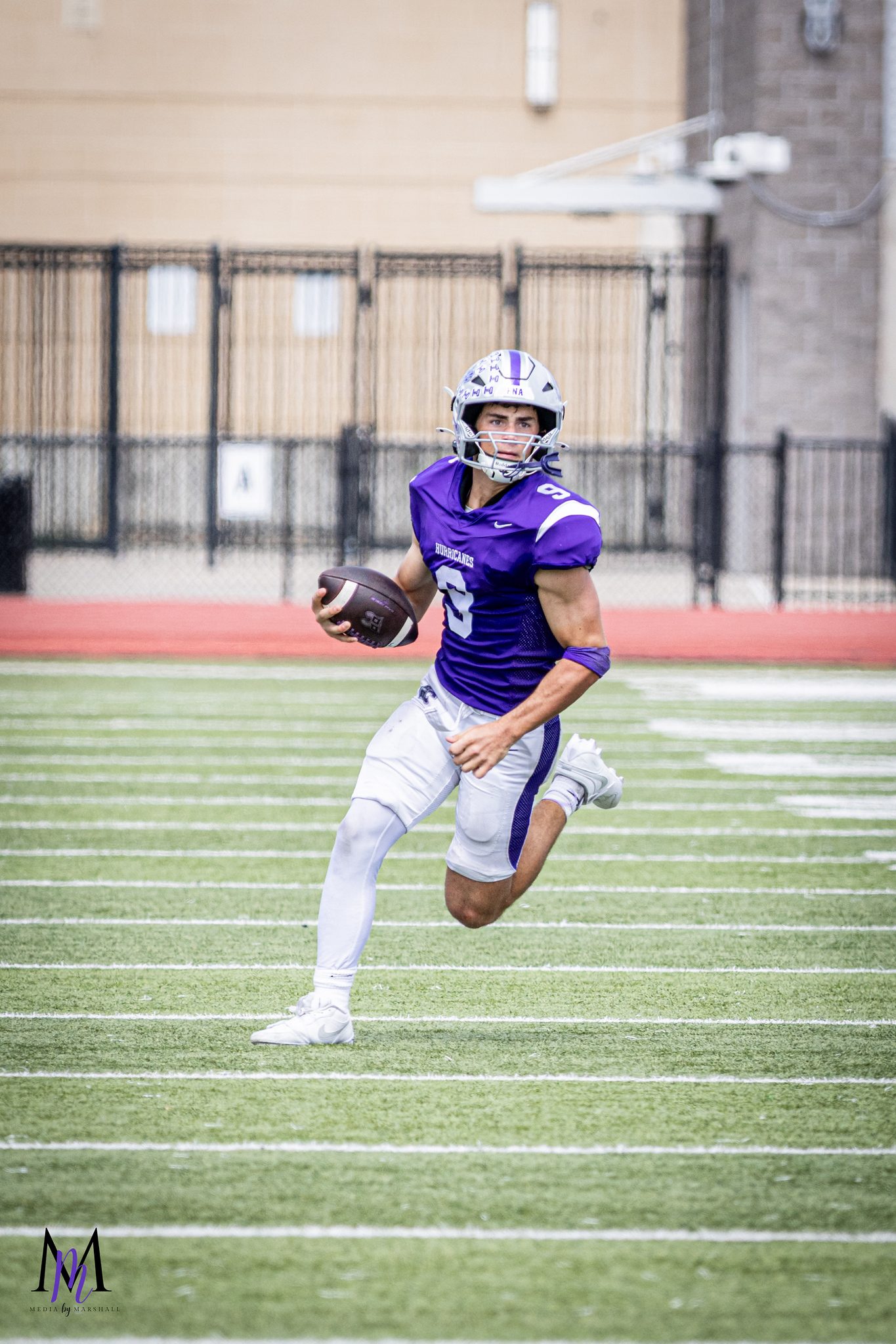 Junior quarterback Jace Hanks scrambles against Collins