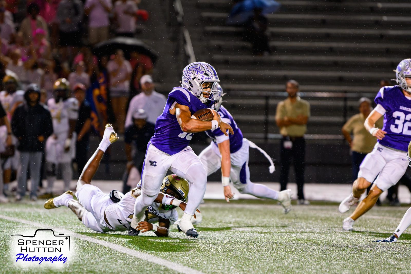 Senior running back Eyan Johnson breaks a tackle on a return against Collins