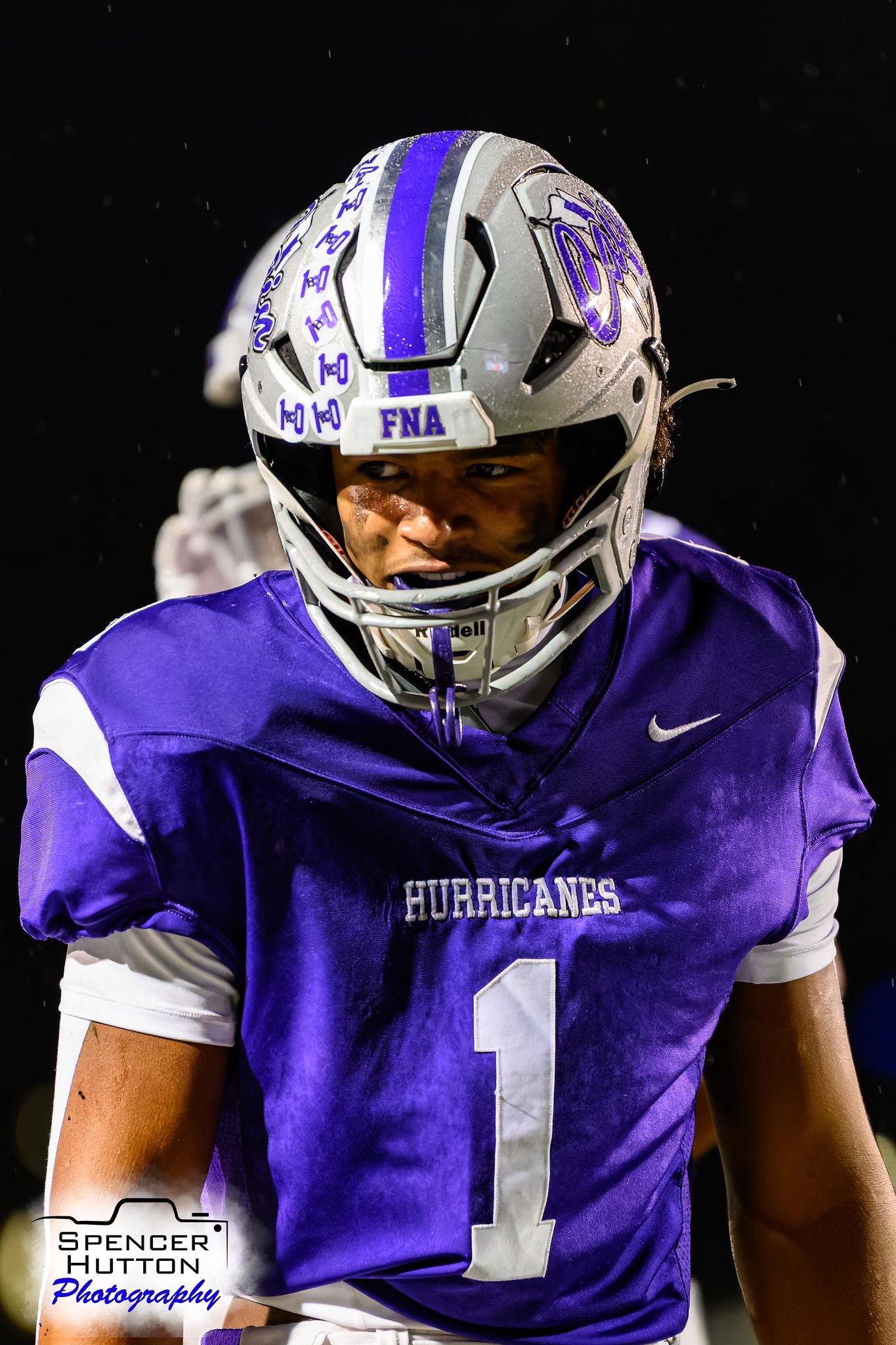Junior Earl Oguinn Jr. in the rain against Collins