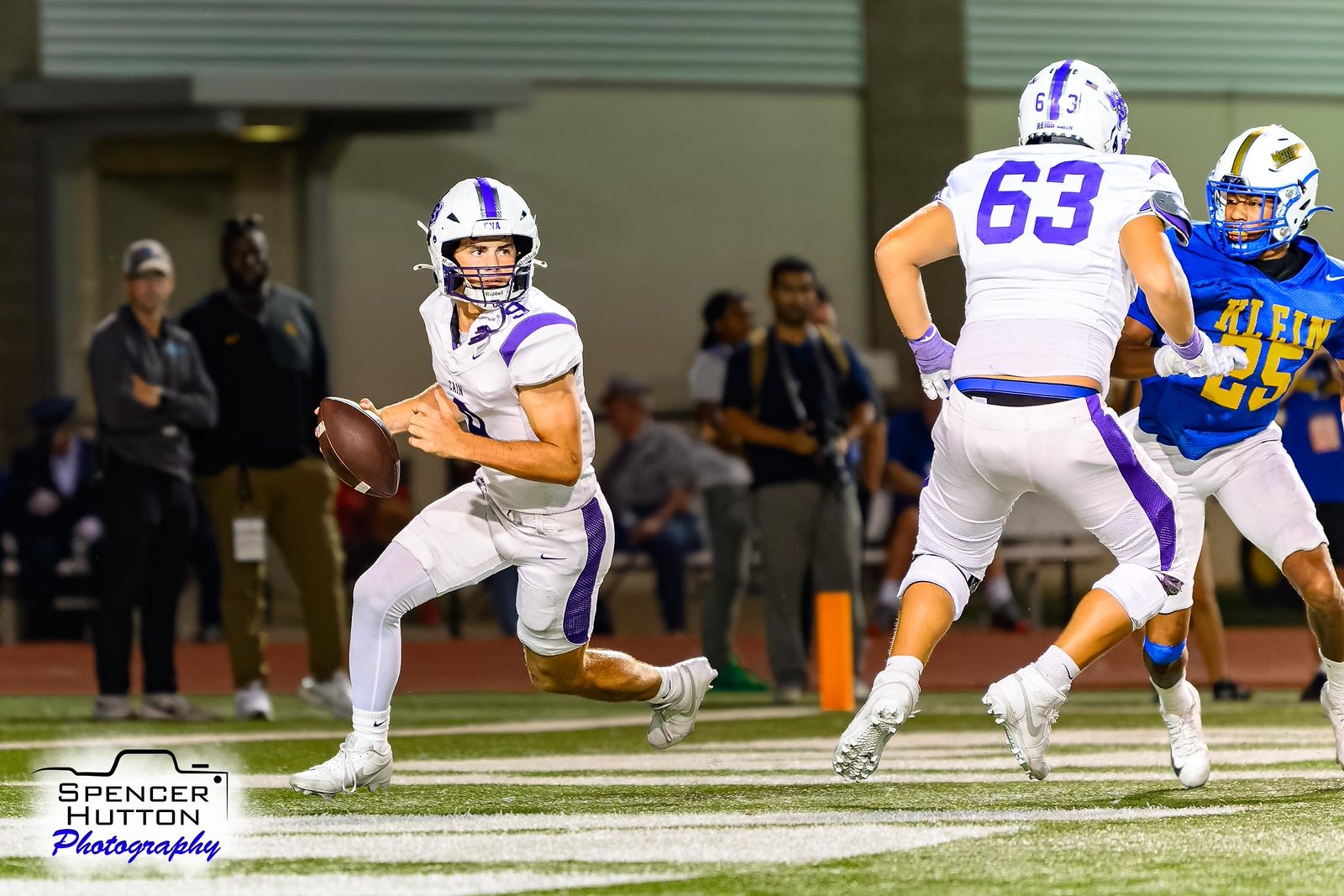 Klein Cain quarterback Jace Hanks keeps the ball and cuts toward the goal line against Klein
