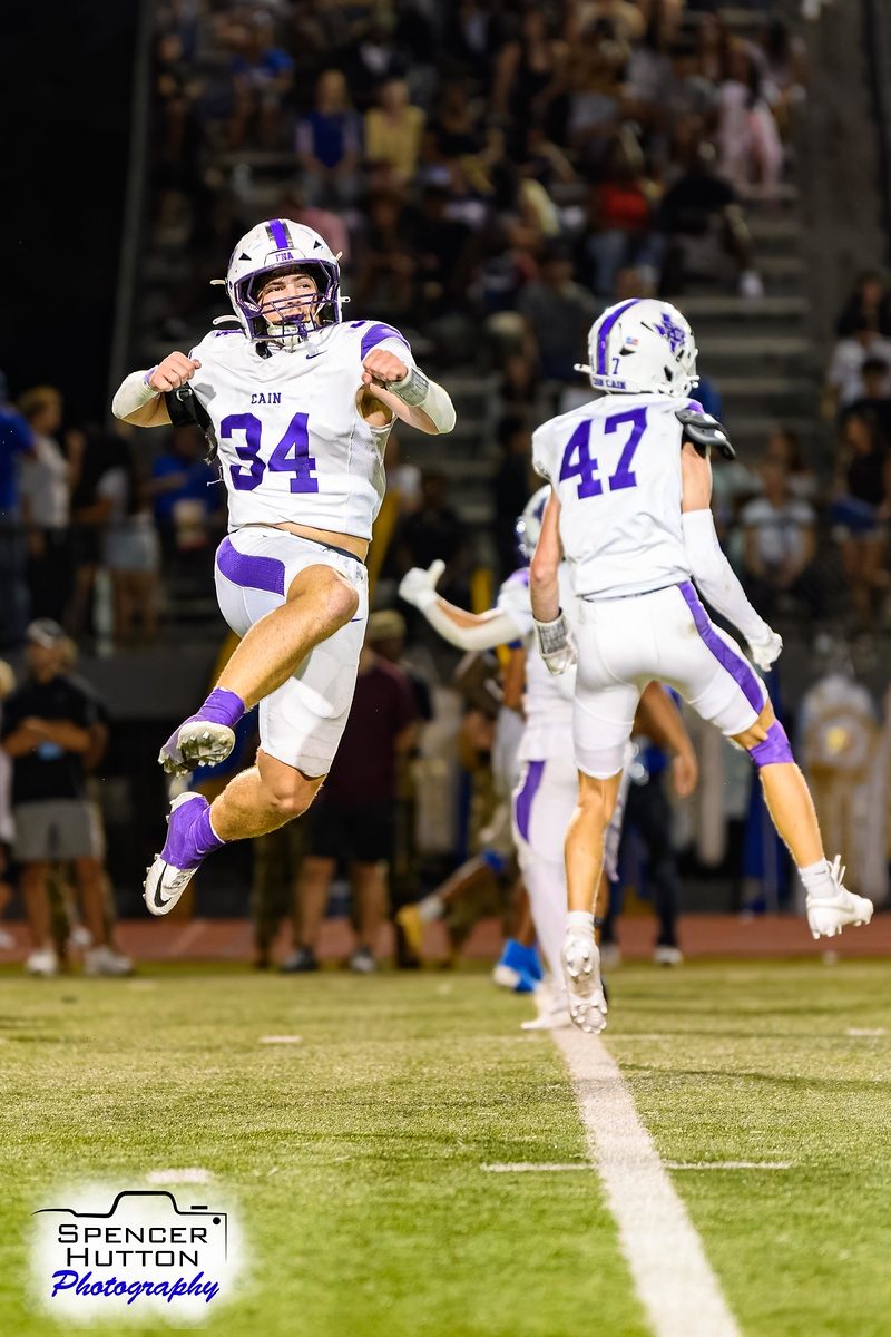Gage Hansberger leaps in celebration after a big defensive stop