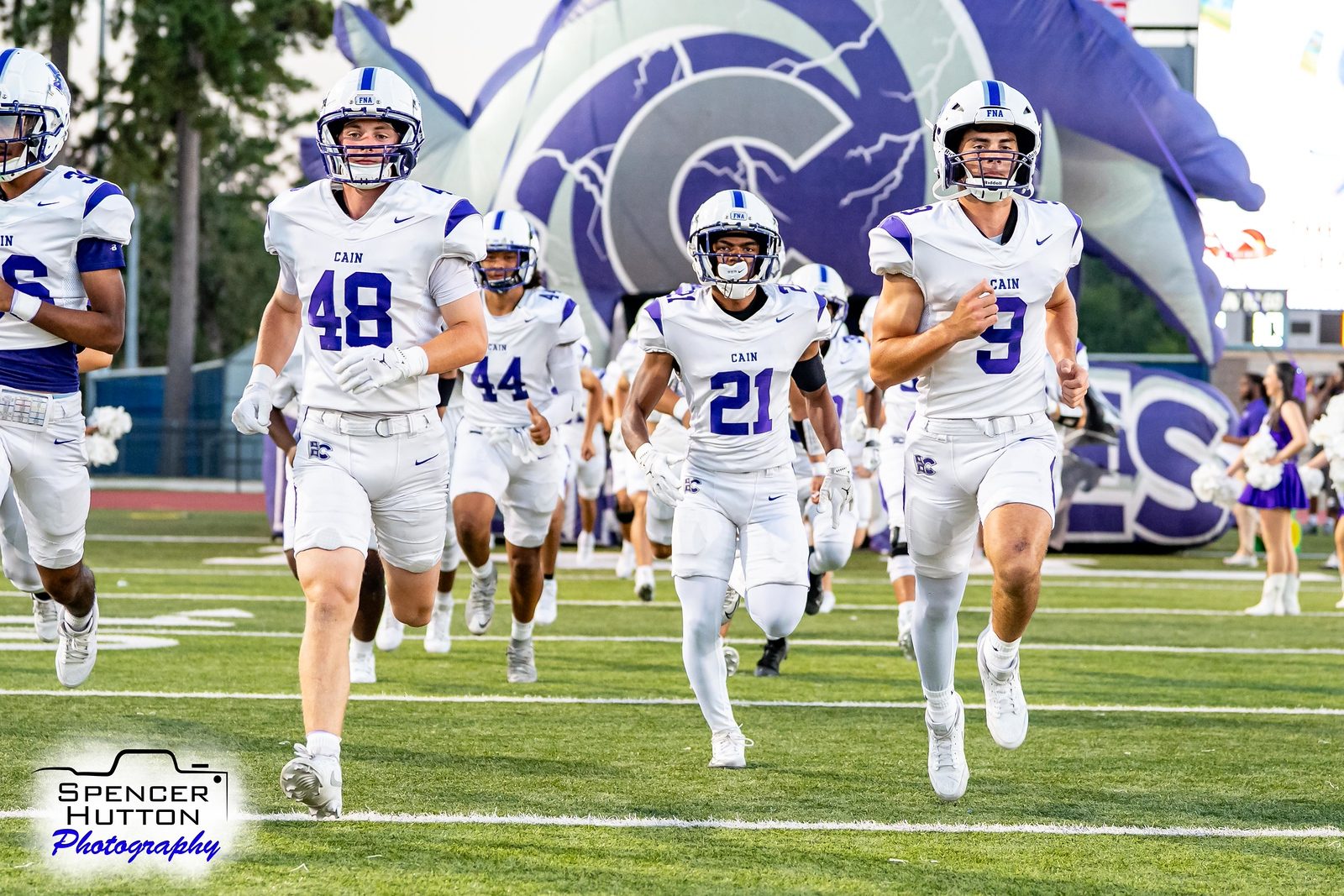 The Hurricanes take the field before the game at Klein Memorial Stadium