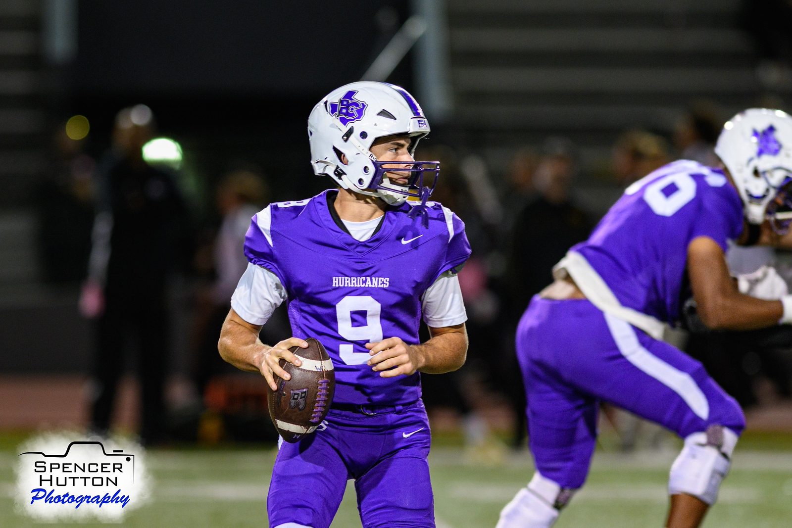 Jace Hanks scans the field as he looks to throw against Klein Oak
