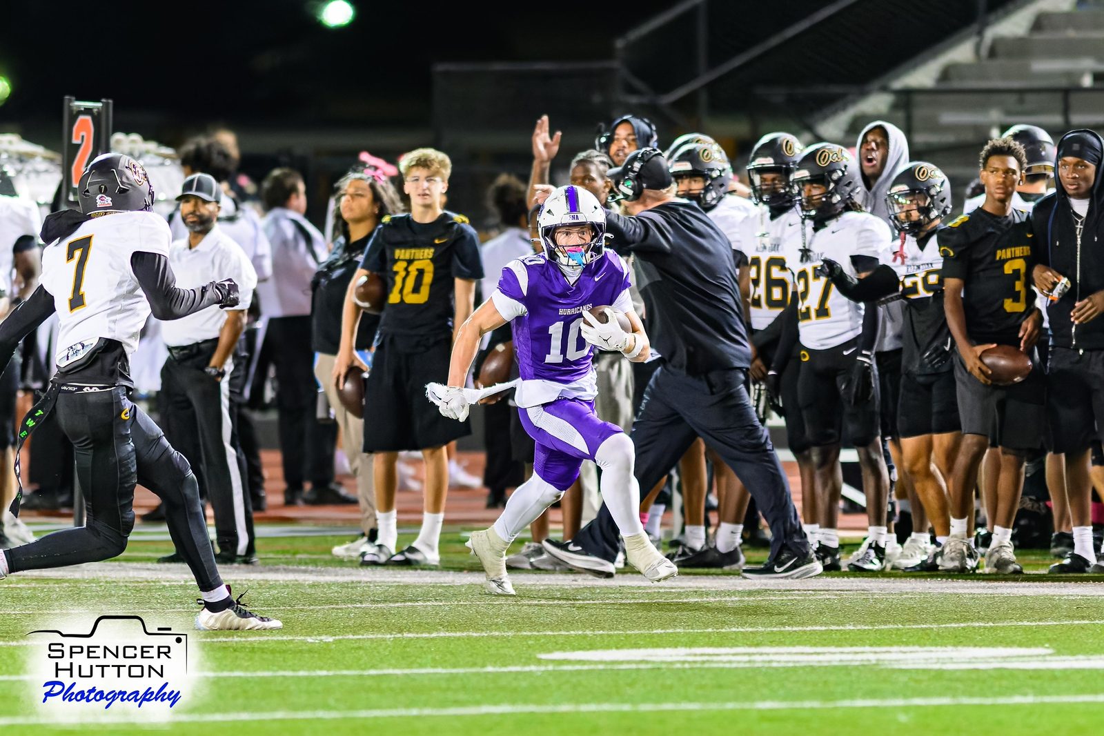 Cooper Karns turns up the Klein Oak sideline with the ball